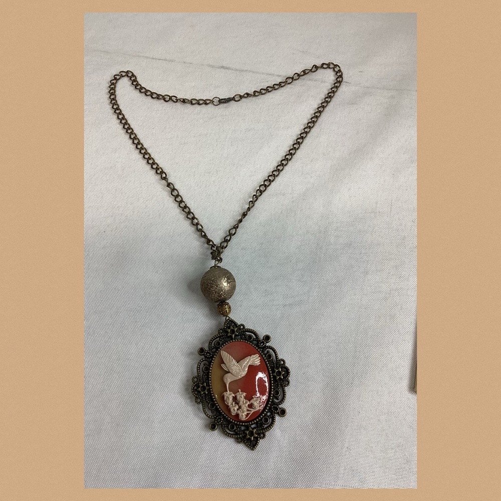 Vintage Bronze Pendant Necklace with Red and Cream Accents